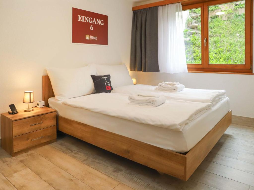 Postel nebo postele na pokoji v ubytování Apartment Nirwana by Interhome