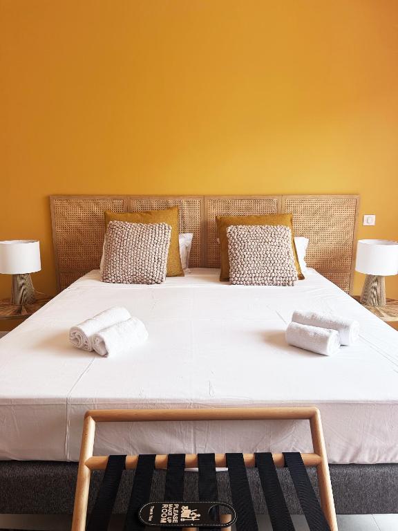 Postel nebo postele na pokoji v ubytování Hôtel A Stretta