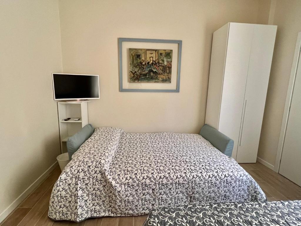 Postel nebo postele na pokoji v ubytování F&F Rooms