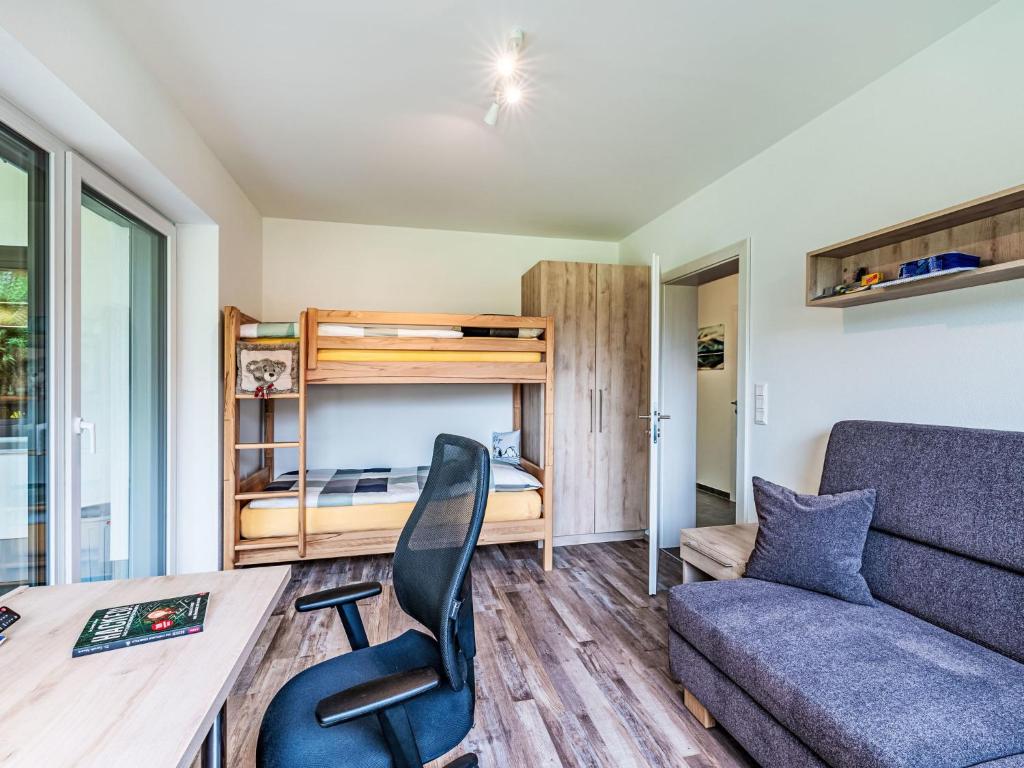 Posezení v ubytování Holiday Home Sonnenteich-Haus by Interhome