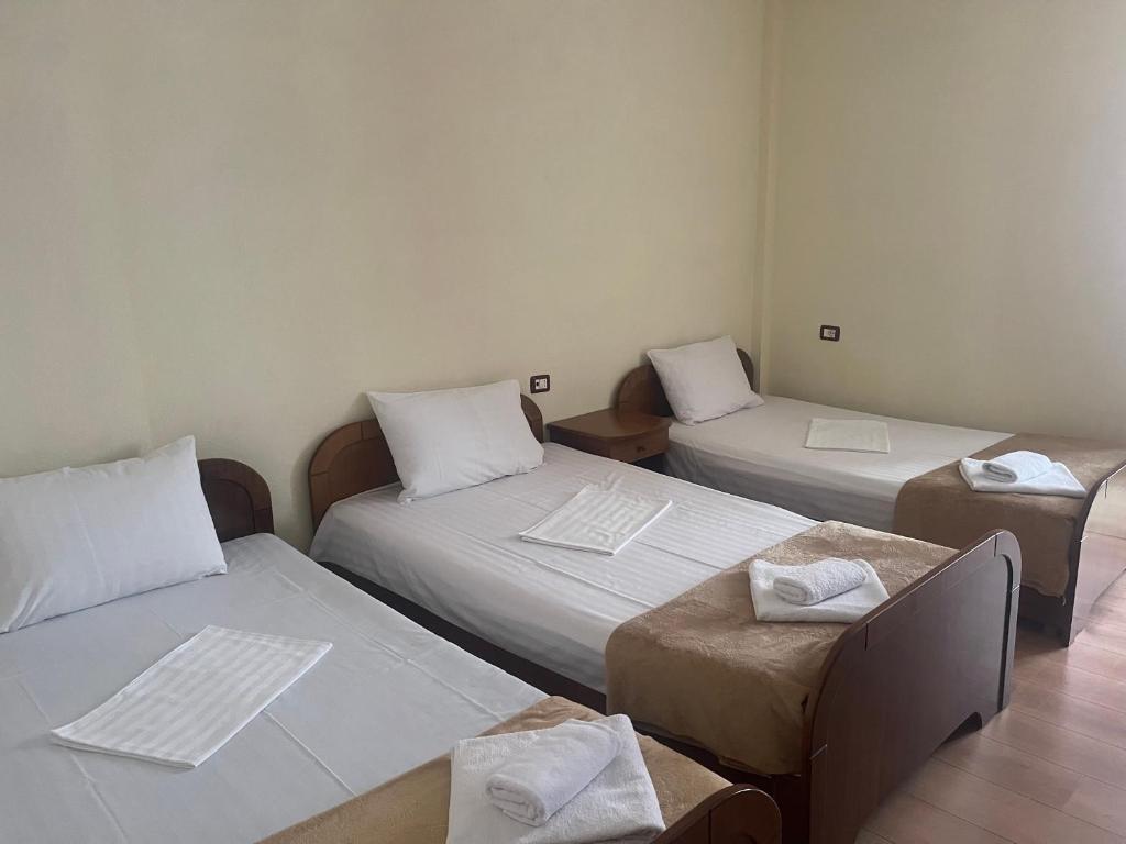 Postel nebo postele na pokoji v ubytování Hotel Saint Marena