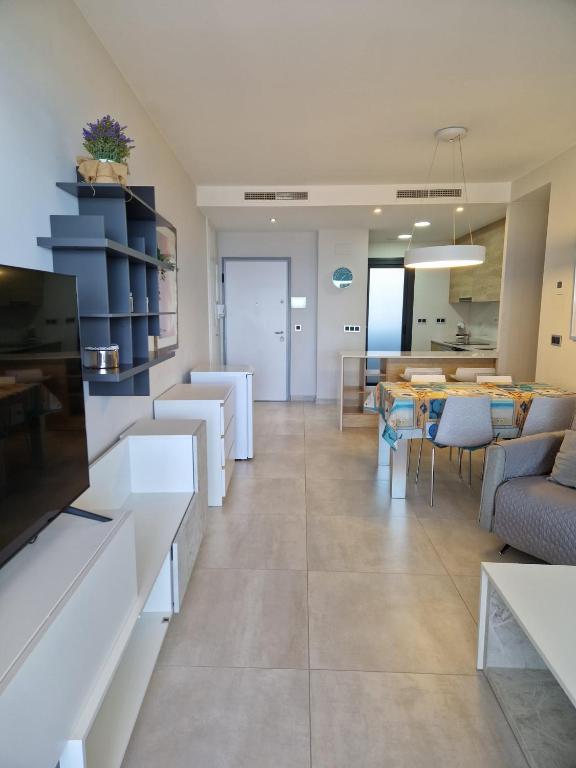 Posezení v ubytování Apartment Sunset Waves Poniente