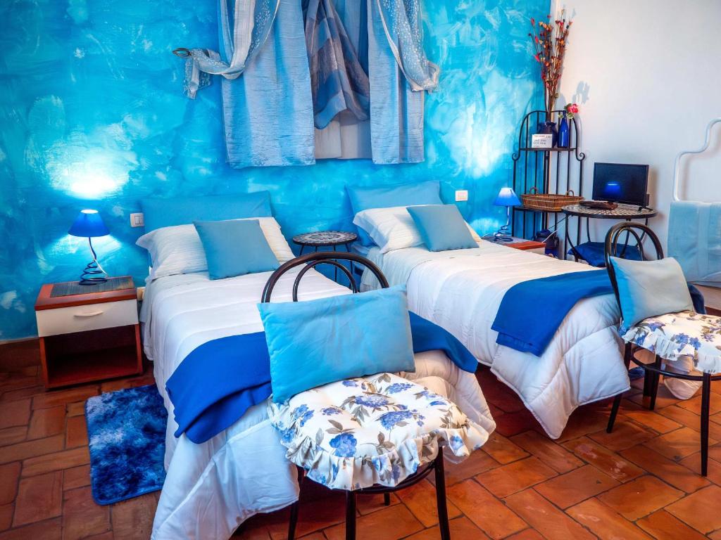 Posteľ alebo postele v izbe v ubytovaní B&B Aesis La Dolce Collina