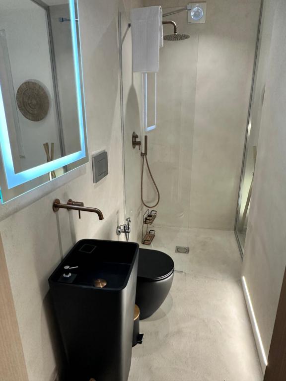 Koupelna v ubytování Rada room&suite