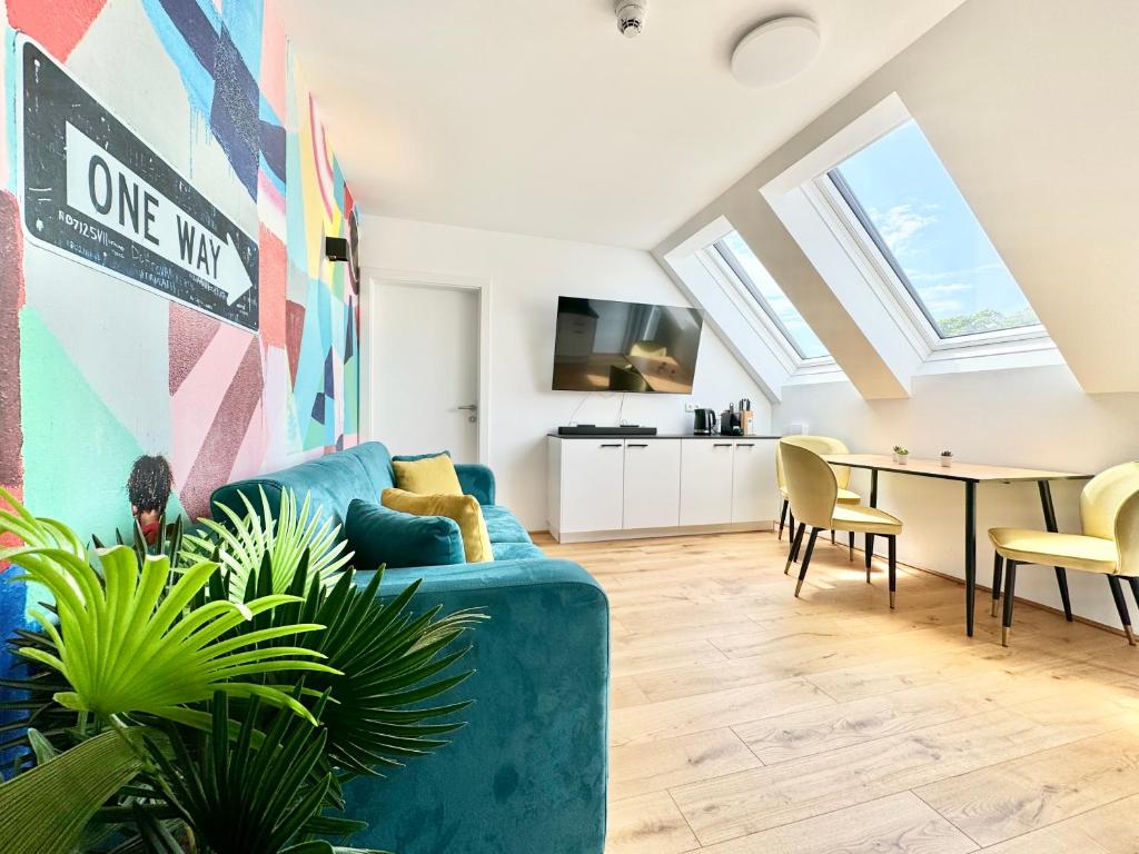 TV a/nebo společenská místnost v ubytování Wohnung mit Balkon