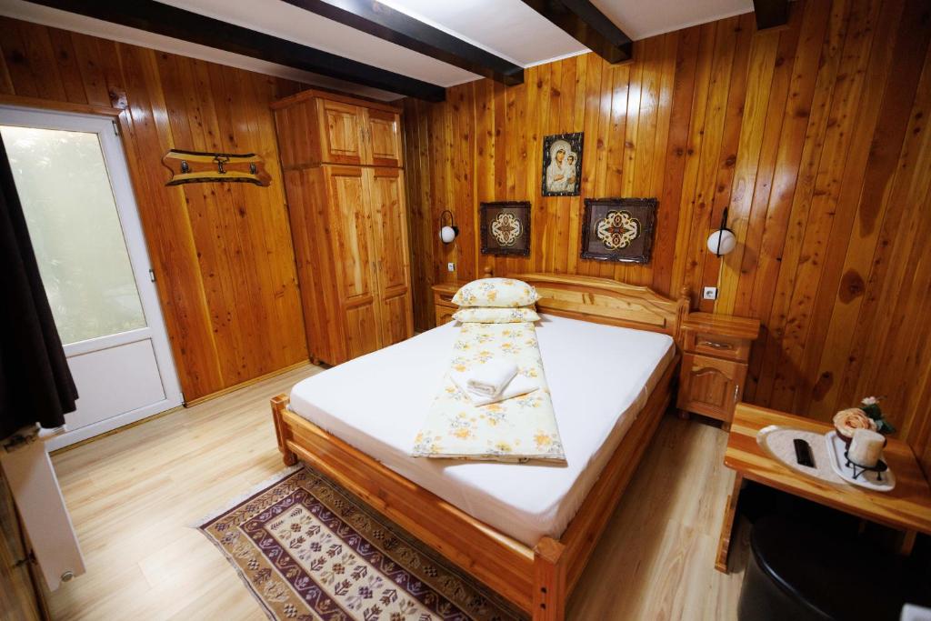 Postel nebo postele na pokoji v ubytování Vila ADR