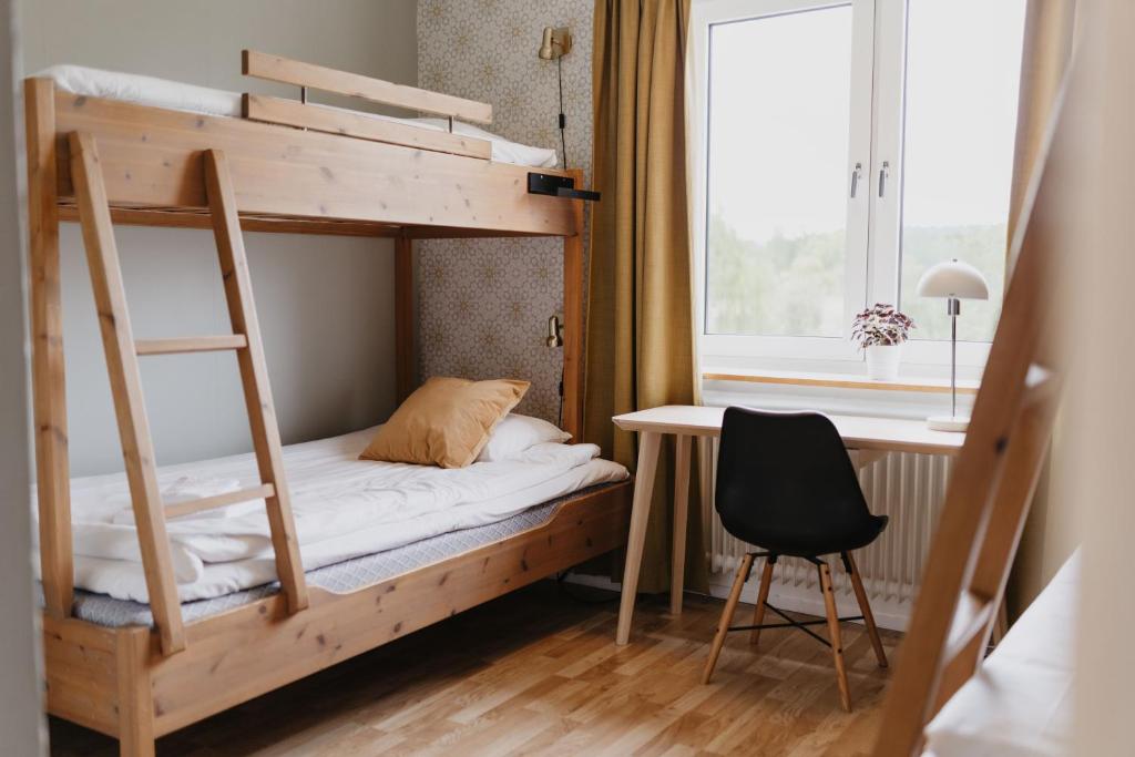 Postel nebo postele na pokoji v ubytování Vassbo Vandrarhem