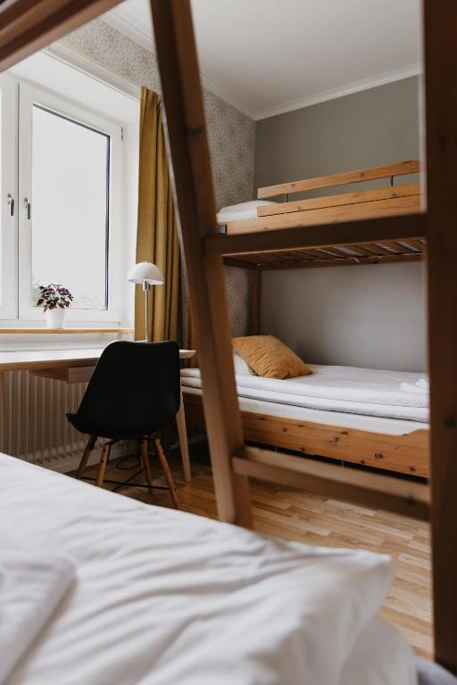 Postel nebo postele na pokoji v ubytování Vassbo Vandrarhem