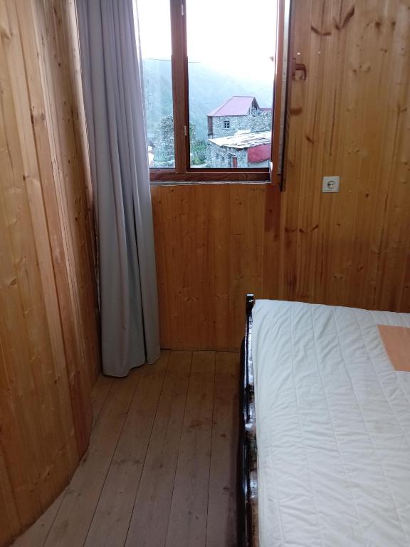 Postel nebo postele na pokoji v ubytování Stone House marexi