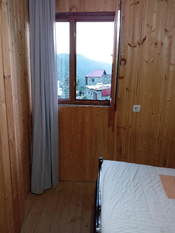 Postel nebo postele na pokoji v ubytování Stone House marexi