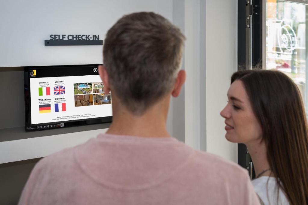 TV a/nebo společenská místnost v ubytování Residence Al Frantoio