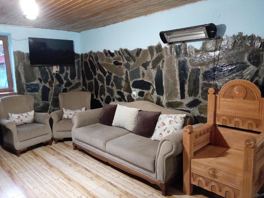 Posezení v ubytování Stone House marexi