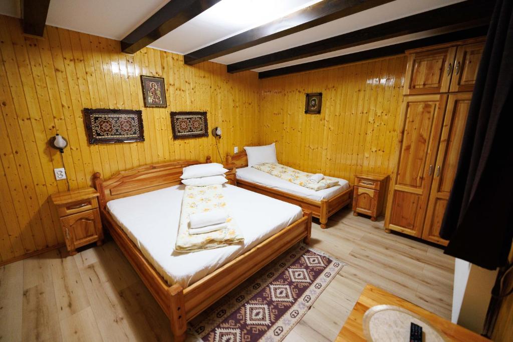 Postel nebo postele na pokoji v ubytování Vila ADR