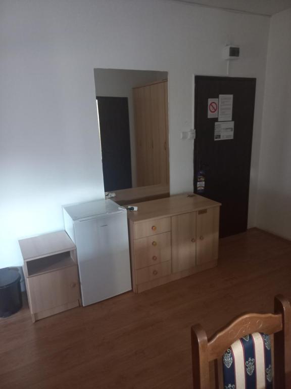 Kuchyň nebo kuchyňský kout v ubytování Hotel Duga