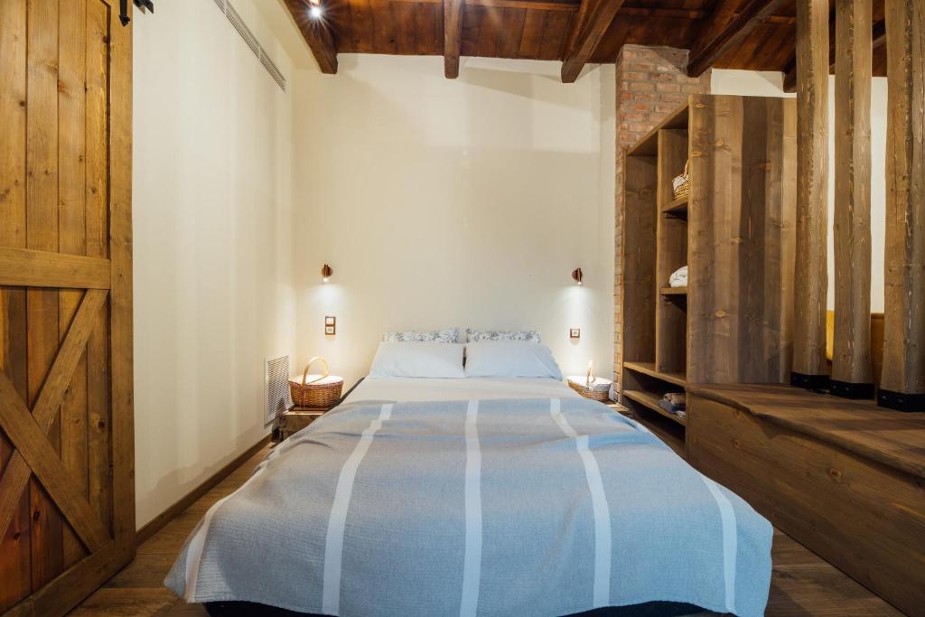 Postel nebo postele na pokoji v ubytování Karaiskos Agritourism Farm