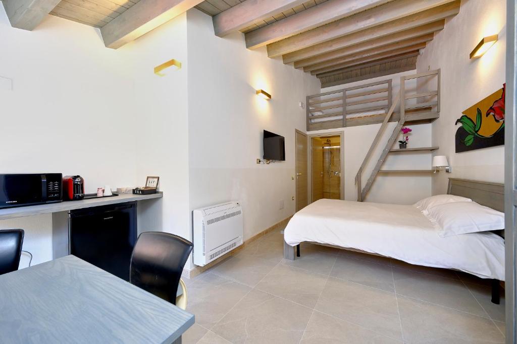 Postel nebo postele na pokoji v ubytování ZENITH Rooms