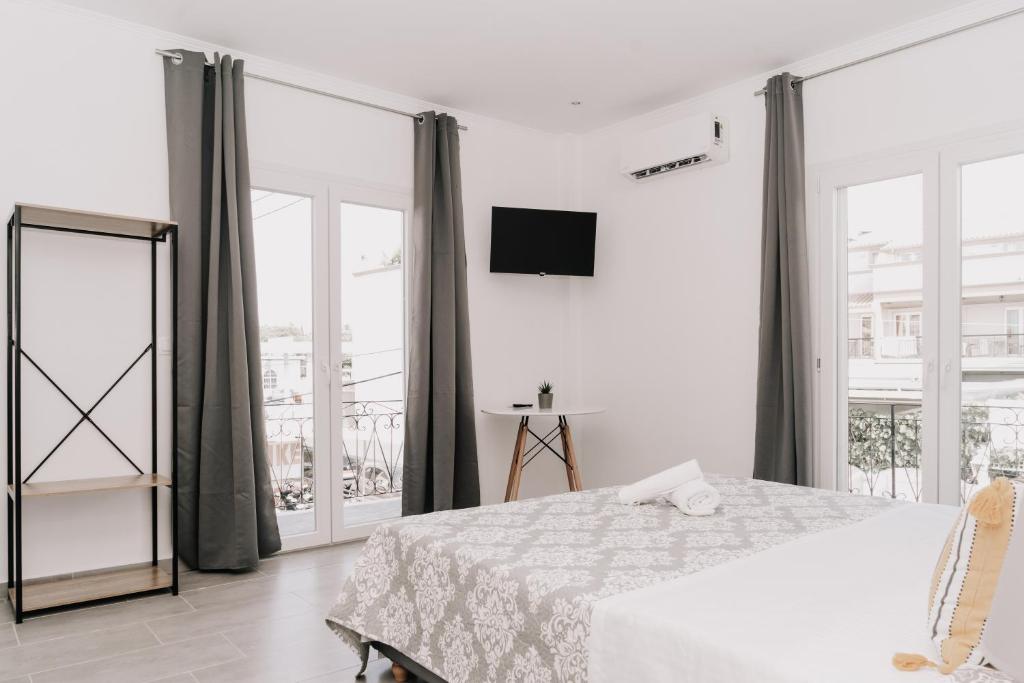 Postel nebo postele na pokoji v ubytování Sea Sailing Apartments