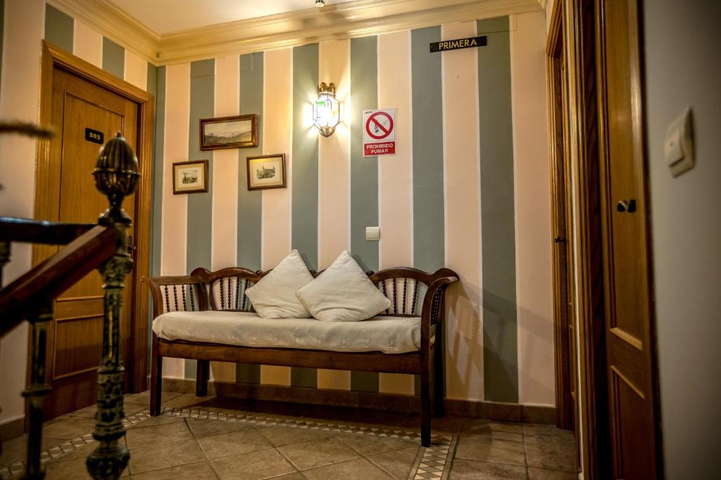 Postel nebo postele na pokoji v ubytování Hostal Tic-Tac