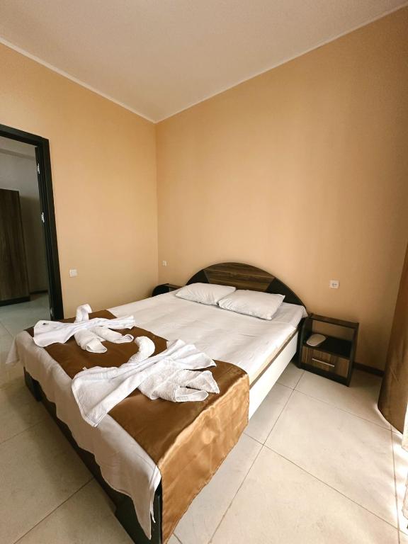 Postel nebo postele na pokoji v ubytování Hotel Solidarity