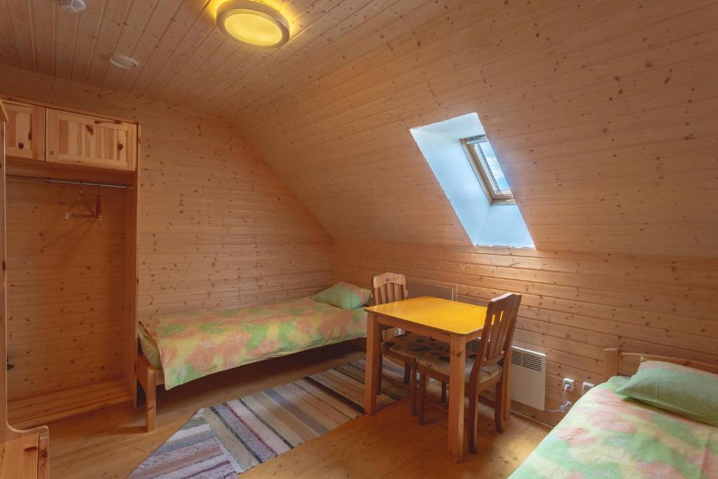 Postel nebo postele na pokoji v ubytování Vaino Turismitalu