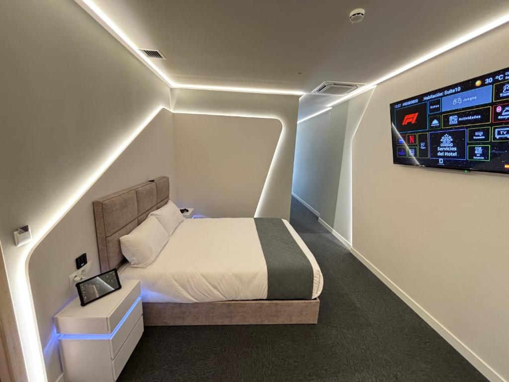 Postel nebo postele na pokoji v ubytování Futurotel Sevilla