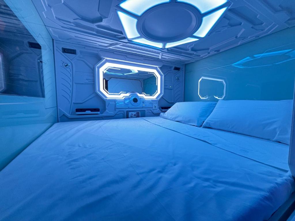 Postel nebo postele na pokoji v ubytování Futurotel Sevilla