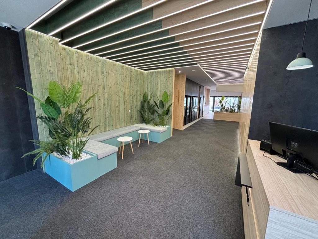 TV a/nebo společenská místnost v ubytování Futurotel Sevilla
