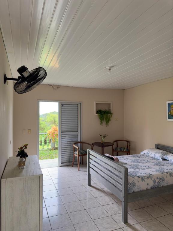 Postel nebo postele na pokoji v ubytování Casa de Campo Romanetto com Piscina e Vista - Antonina