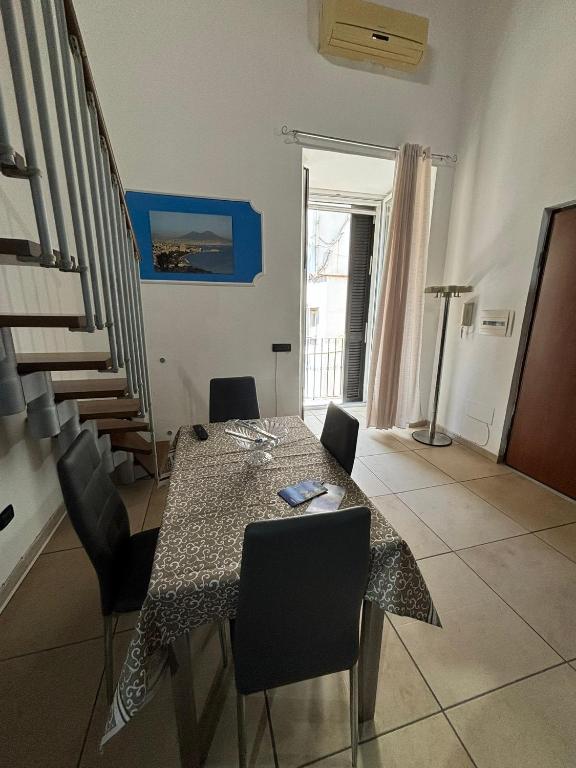 A seating area at Azzurra Apartment