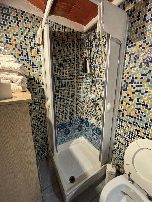 A bathroom at Azzurra Apartment