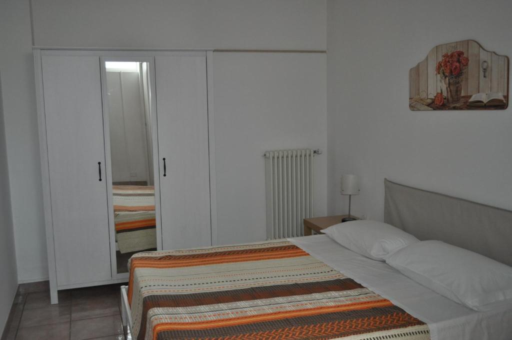 Postel nebo postele na pokoji v ubytování La Specchia