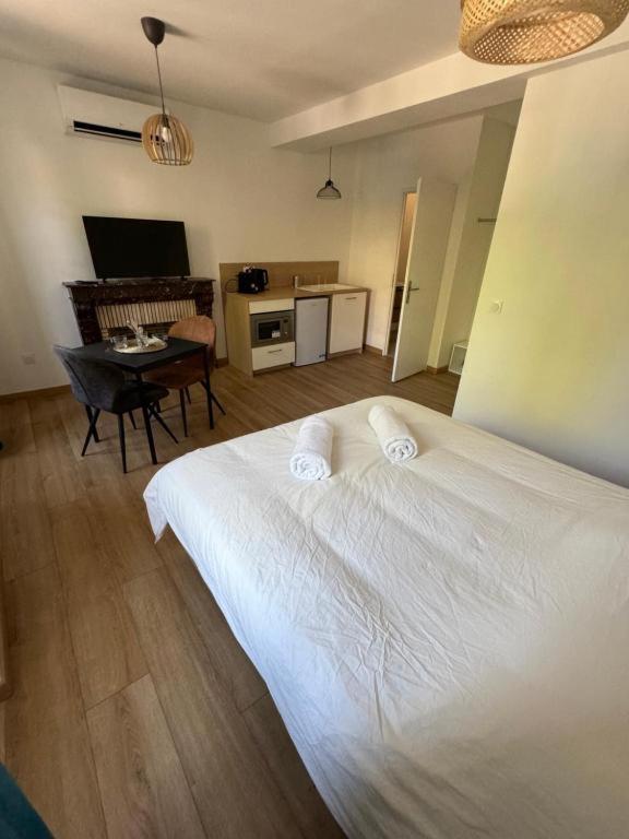 Postel nebo postele na pokoji v ubytování Comme à la Maison