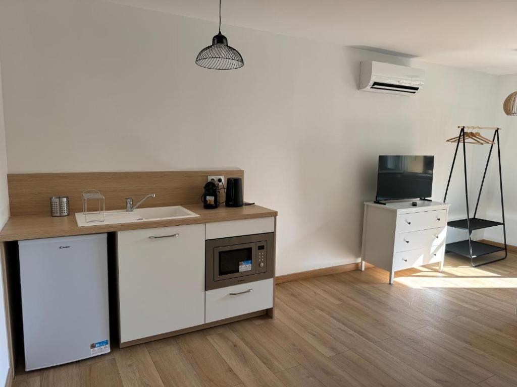 Kuchyň nebo kuchyňský kout v ubytování Comme à la Maison