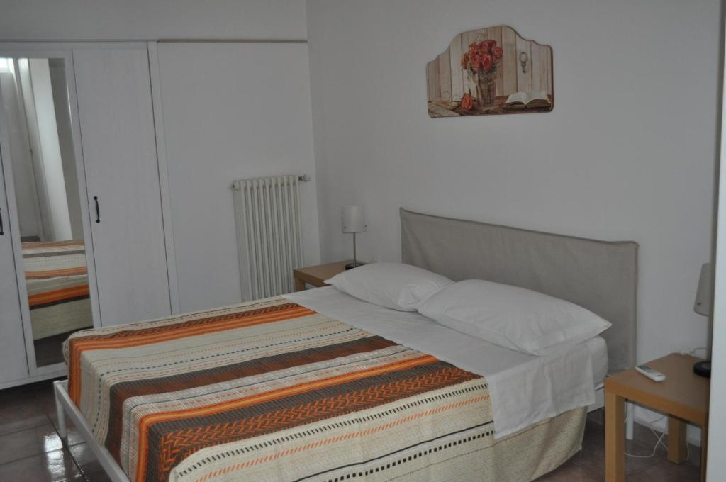 Postel nebo postele na pokoji v ubytování La Specchia