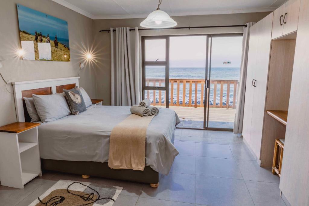 Postel nebo postele na pokoji v ubytování Mitford-on-Sea