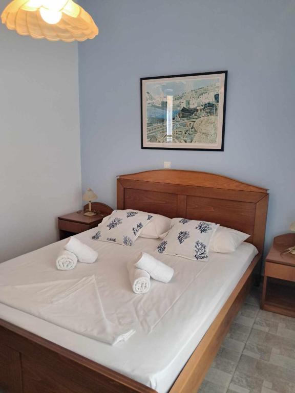 Postel nebo postele na pokoji v ubytování Aegean Star Hotel