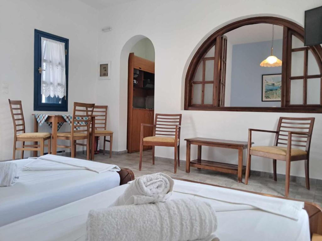Postel nebo postele na pokoji v ubytování Aegean Star Hotel
