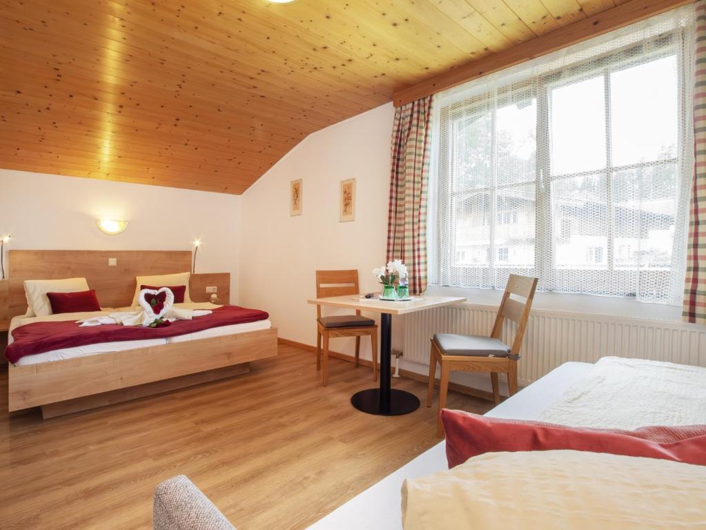 Posteľ alebo postele v izbe v ubytovaní Haus Sonnleitn