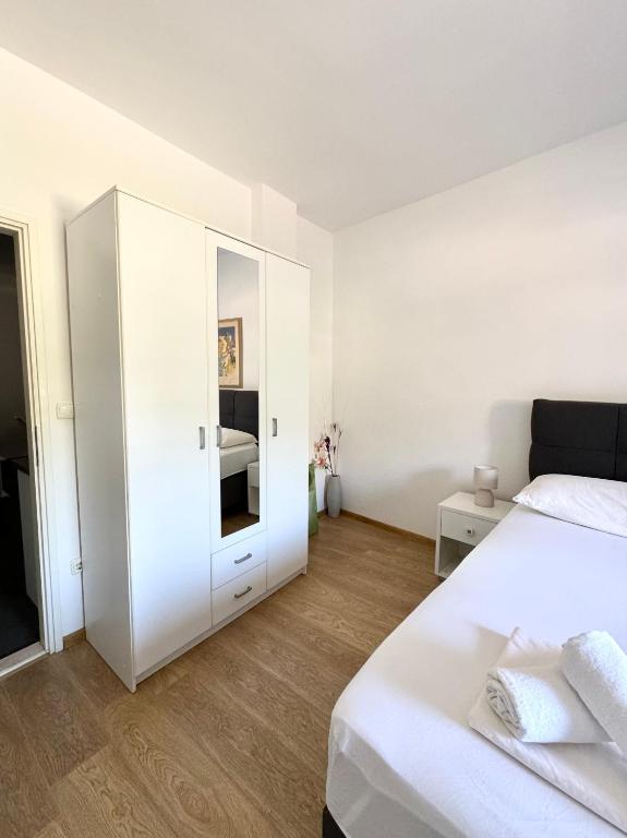 Postel nebo postele na pokoji v ubytování Apartment Gitara