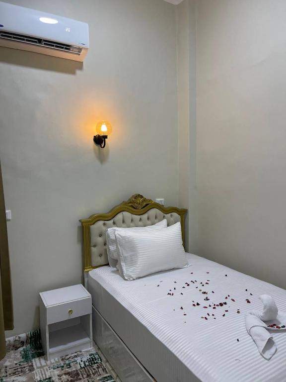 Postel nebo postele na pokoji v ubytování Future Hostel