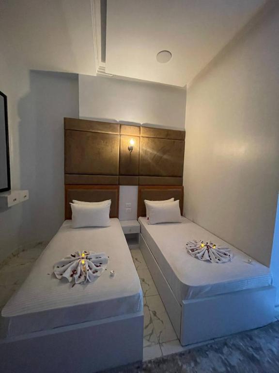 Postel nebo postele na pokoji v ubytování Future Hostel