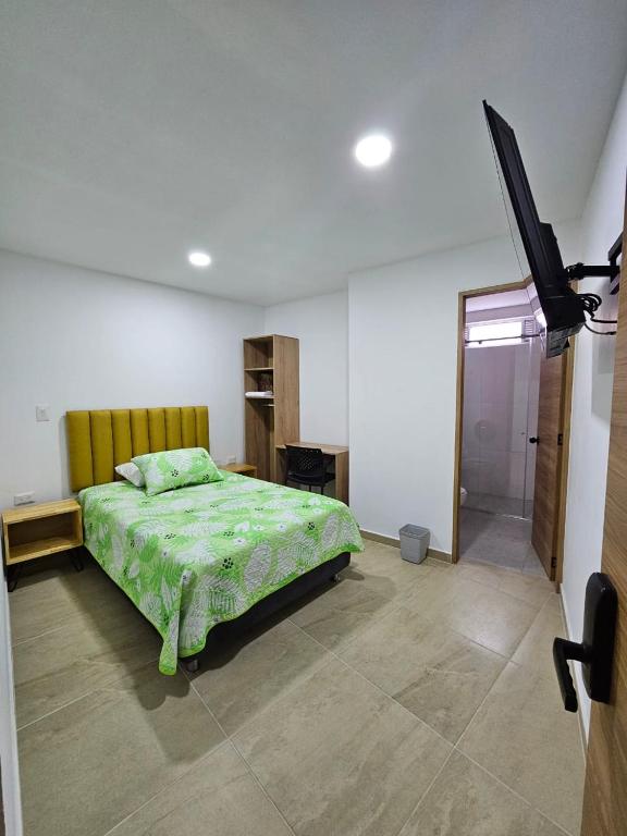 Postel nebo postele na pokoji v ubytování BISÁU Hotel