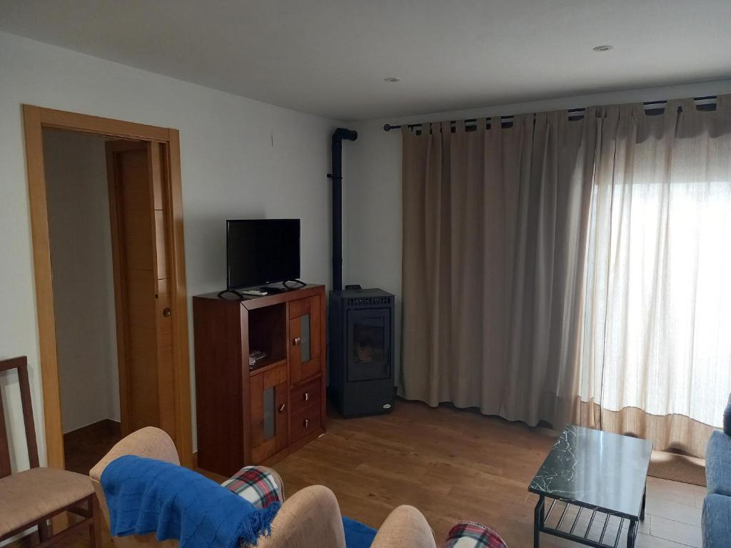 TV a/nebo společenská místnost v ubytování Casa Isabel