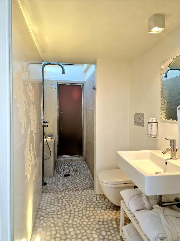 Koupelna v ubytování Luxor Beach Boutique Hotel Cattolica