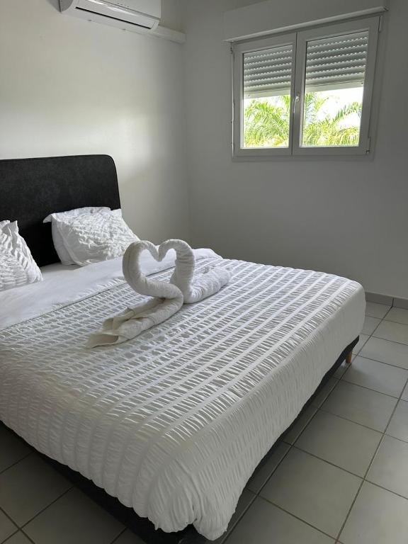 Voodi või voodid majutusasutuse Appartement T2 Chic - vue mer et montagne toas