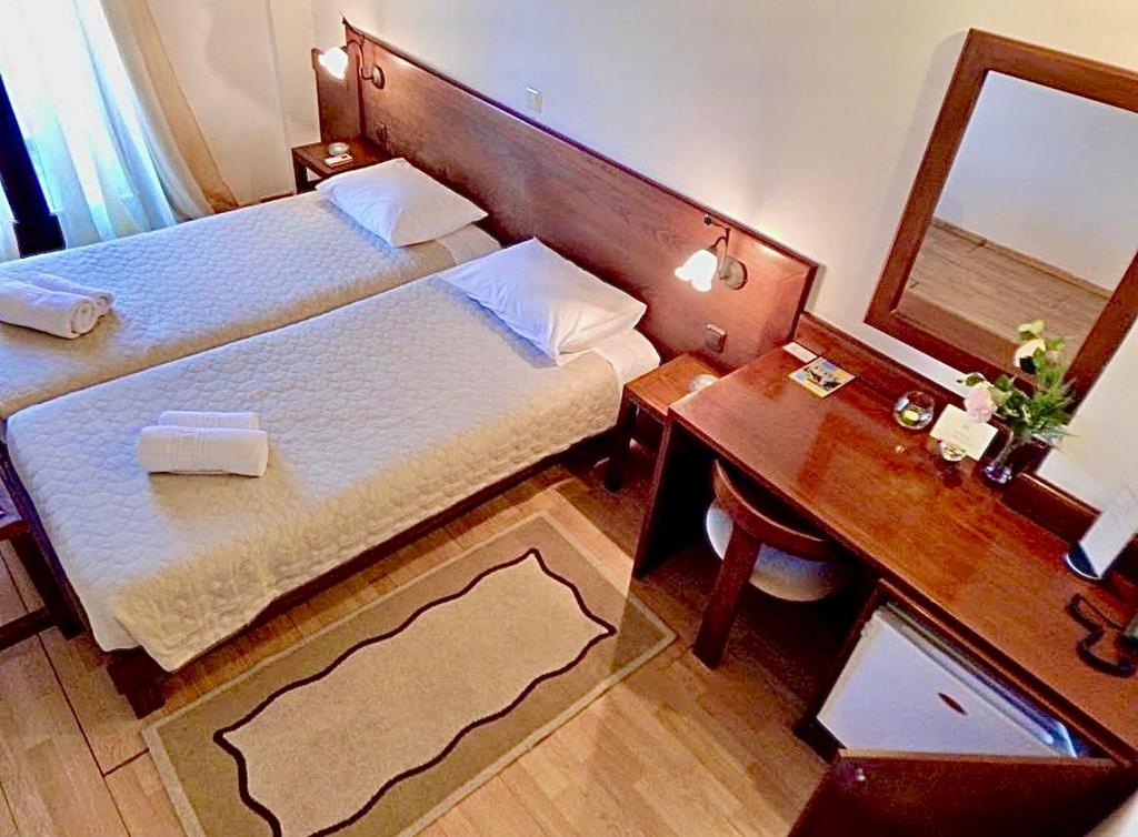Postel nebo postele na pokoji v ubytování Philoxenia