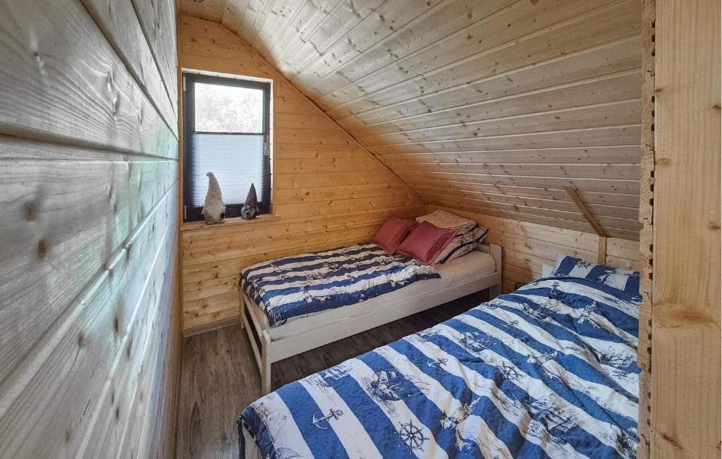Posteľ alebo postele v izbe v ubytovaní 2 Bedroom Lovely Home In Szczecin