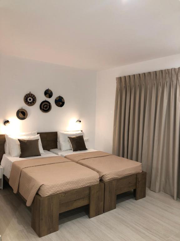 Postel nebo postele na pokoji v ubytování Fiosal Apartments 3