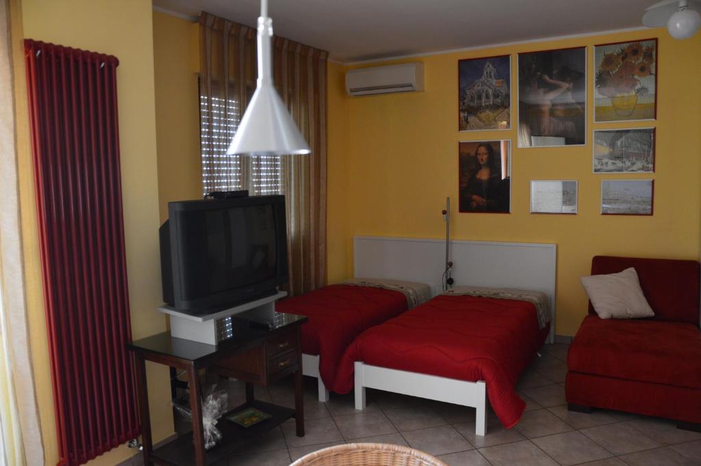 Telewizja i/lub zestaw kina domowego w obiekcie Casa Dei Puzzle