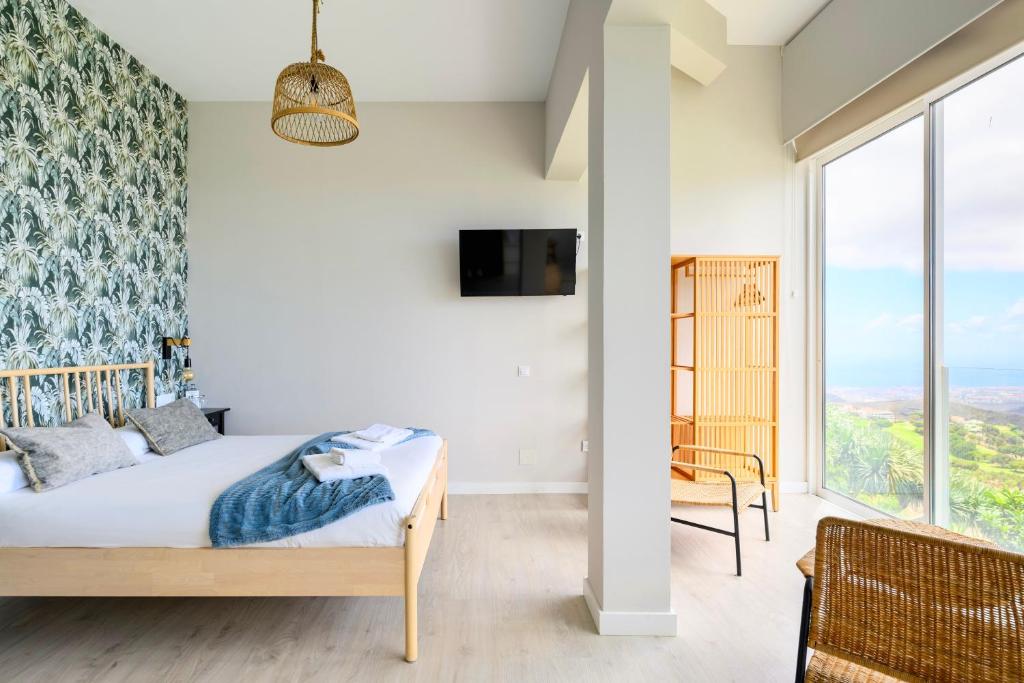 Postel nebo postele na pokoji v ubytování Villa Dama by airnest
